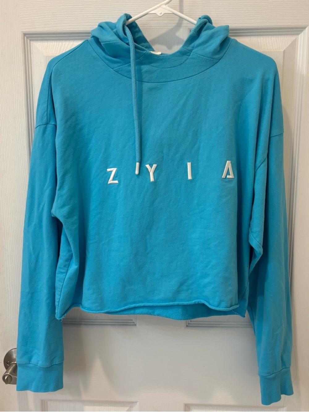 Zyia Bright Teal Cropped Hoodie with Embroidered Lettering
